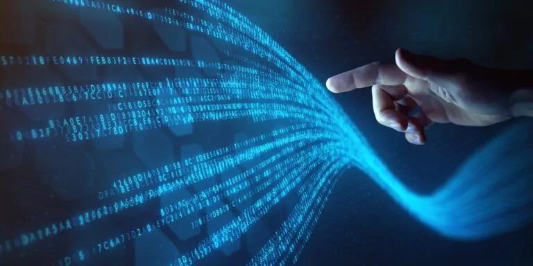 Human hand reaching out to a stream of data.