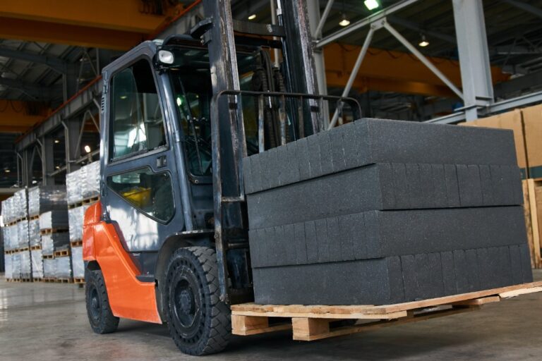 Forklift with aerated concrete blocks at a construction warehouse